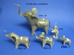 1 Dozen 4 inch wholesale elephant  novelties made out of crushed oyster shells and clay $9.60 dz (.80 ea) ; 5 dz @ $8.64 dz (.72 ea)