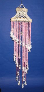 45" Wholesale dyed pink nassarius spiral wind chime with cowrie shells, white cut shells - Minimum: 2 @ $9.95 ea (Case of 6 @ $8.955 ea)
