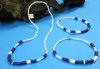 Two Tone Purple and White Puka Shell Jewelry with Tiny Beads 18" $5.00 a dz; 9" $4.00 a dz; 7-1/2" $4.00 a dz