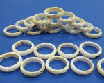 Seashell Rings Wholesale and Carved Strombus  Rings in a  Rope Design -  1 pack of 100 pcs @ .24 ea; 5 packs (500) @ .22 ea; 10 packs (1000) @ .20 ea