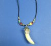 3/4 to 1-1/2 inches wholesale alligator tooth necklaces with a tiny gator and multi colored beads 20" - Packed 3 @ $4.25 each; Packed 12 @ $3.75 