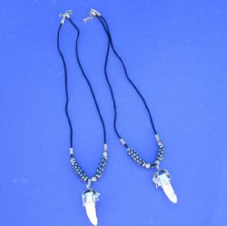 3/4 to 1-1/2 inch wholesale alligator tooth necklaces with white stars on navy blue beads, with tiny gator, 20" -  3 pcs @ $4.25 each; 12 pcs @ $3.75 each