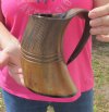Buffalo horn mug carved with full rustic look measuring 7" tall.  You are buying the horn mug pictured for $26