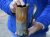 Buffalo horn mug half polished and half rustic carved measuring 6-1/2" tall.  You are buying the horn mug pictured for $29