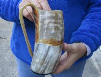 Ox horn mug half polished and half rustic carved measuring 6-1/2" tall for $29