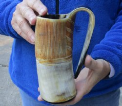 Cow horn mug half polished and half rustic carved measuring 6-1/2" tall for $29