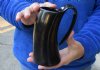 Polished buffalo horn mug measuring approximately 5-1/2 inches tall. You are buying the horn mug pictured for $19