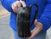Polished buffalo horn mug measuring approximately 6-1/2 inches tall. You are buying the horn mug pictured for $26