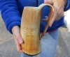 Buffalo horn mug carved with full rustic look measuring 8-1/2 inch tall. You are buying the horn mug pictured for $36