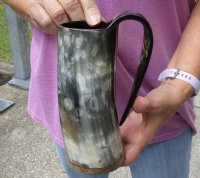 Polished buffalo horn mug with wood base/bottom measuring approximately 7 inches tall. For sale for $30