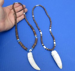 2 pc Coconut bead necklaces with 2-1/2 and 2-3/4 inch Alligator tooth wrapped with a silver color wire - $28/lot