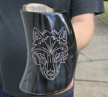 Polished Buffalo Horn Mug, Cow Horn Mug with carved wolf design 6" tall. Available to purchase for $32