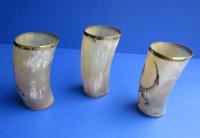 Wholesale Buffalo Horn Cup/Glass with brass rim, Dinosaur decal and wood bottom - 5 to 5-1/2 inches tall - 2 pcs @ $7.50 each; 12 pcs @ $6.75 each