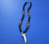 Wholesale alligator tooth necklaces with silver colored alligator design cap with black and white coco beads with mauve tube bead and mixed shells chips - Packed: 3 pcs @ $5.00 each; Packed: 12 pcs @ $4.50 each