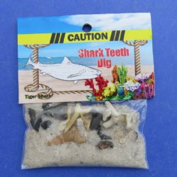 Souvenir bag of fossil shark teeth and pieces in sand novelty - 60 bags @ $.90 a bag 