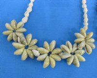 18 inches shell leis wholesale made out of nassarius shells with Cowrie flowers - 1 dozen @ $9.60 dz; 8 dozen @ $8.40 dz