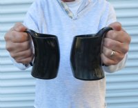 Wholesale Polished buffalo horn mug measuring 5" tall.  You are buying a buffalo horn mug similar to the ones pictured - Packed: 2 pcs @ $15.00 ea; Pack of 15 pcs @ $13.50 each   