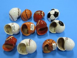 Painted Hermit Crab Shells in Sports Ball Designs 1-1/4" to 2" Packed: 50 pcs @ $.50 each; Packed: 200 pcs @ $.45 each