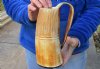 Buffalo horn mug carved with full rustic look measuring 8 inch tall. You are buying the horn mug pictured for $36
