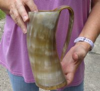 Polished buffalo horn mug with wood base/bottom measuring approximately 8 inches tall. You are buying the horn mug pictured for $36