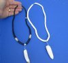 2 pc Coconut bead necklaces with 2-1/4 inch Alligator tooth wrapped with a silver color wire - You will receive the ones in the photo for $20/lot