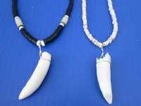 2 pc Coconut bead necklaces with  2-1/4 and 2-3/4 inch Alligator tooth wrapped with a silver color wire - You will receive the ones in the photo for $20/lot