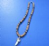 Wholesale alligator tooth necklaces with silver colored alligator design cap with black, brown and white coco beads - Packed: 3 pcs @ $5.00 each; Packed: 12 pcs @ $4.50 each