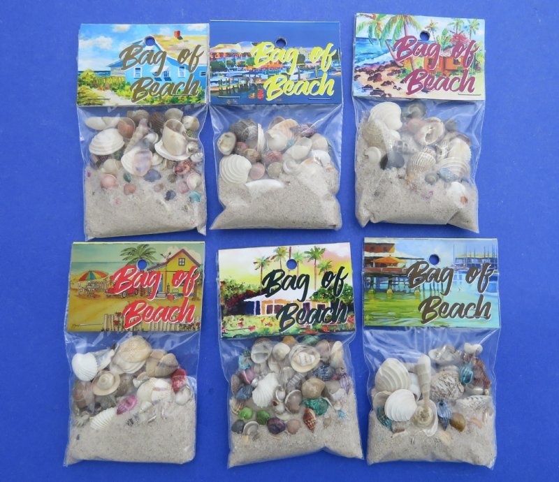 Souvenir bag of sand with an assortment of mixed shells seashell