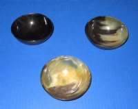 Wholesale Polished buffalo horn bowl measuring 4 long by 2 deep. You are buying a buffalo bowl similar to the ones pictured - Packed: 2 pcs @ $5.75 each; Packed: 12 pcs @ $5.00 each