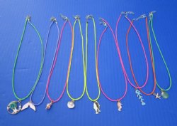 Wholesale Assorted Sea life Charm necklace on 18" multi-colored cord with gold colored clasp - 5 pcs @ $2.00; 25 pcs @ $1.75 each