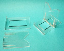 2 Piece Plastic Acrylic Easel Stands, Shell Stands, Agate Stands 3-3/8" x 2-1/8" x 3" - 12 pcs @ $.90 each; 60 pcs @ $.80 each 