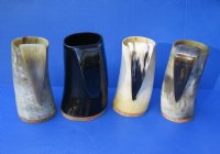 Wholesale Polished buffalo horn mug with wood base/bottom measuring 6 inches tall. $22.00 each; Packed: 6 pcs @ $19.50 each -  You are buying a buffalo horn mug similar to the ones pictured 