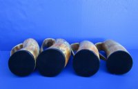 Wholesale 8 inch Natural Viking buffalo horn mugs, half carved, half buffed.  You are buying a buffalo horn mug similar to the ones pictured $32.00 each; Packed: 6 pcs @ $28.00 each