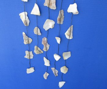 Wholesale Natural MOP Shells with driftwood hanger 17 inches -  50 pcs @ $1.53 each